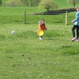 children playing on the campsite