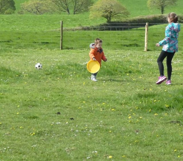 children playing on the campsite